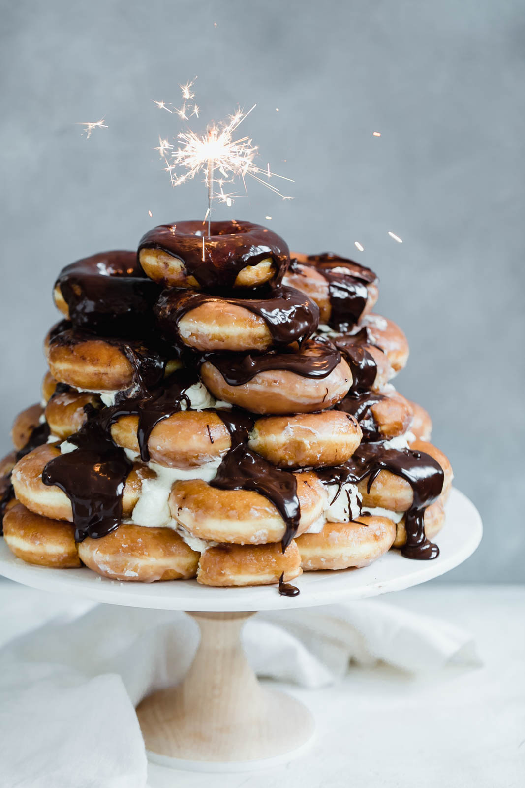 Krispy Kreme Donut Cake: a cake made entirely from Krispy Kreme donuts and mixed with chocolate sauce. I died and went to heaven.