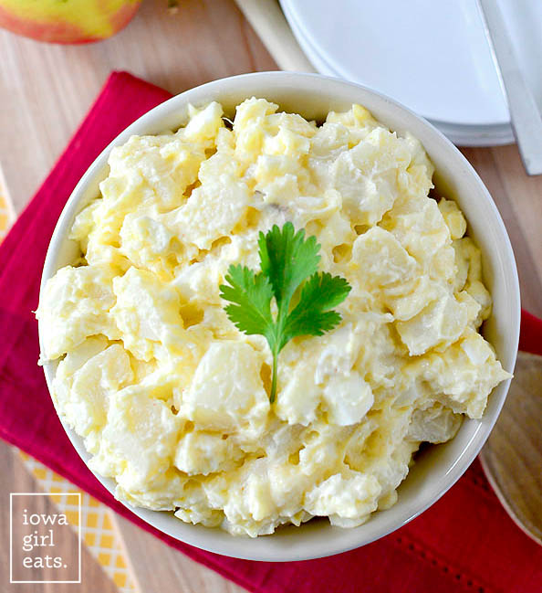 overhead photo of a classic creamy potato salad bowl