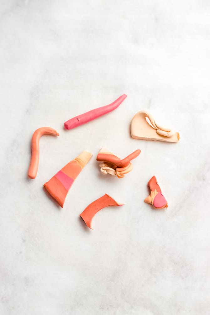 scraps of pink and orange polymer clay