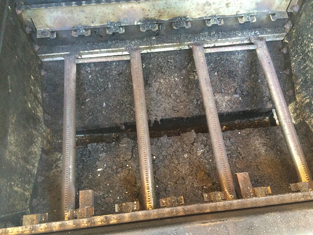 Removed firebox with blister and Flavorizer bar