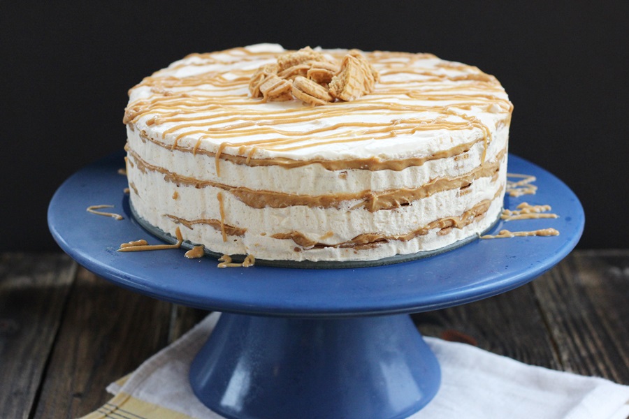 Nutter Butter Icebox Cake - Ice cream cake recipe made with Nutter Butter cookies, peanut butter cream sauce and peanut butter whipped cream. So rich! | www.worthwhisking.com