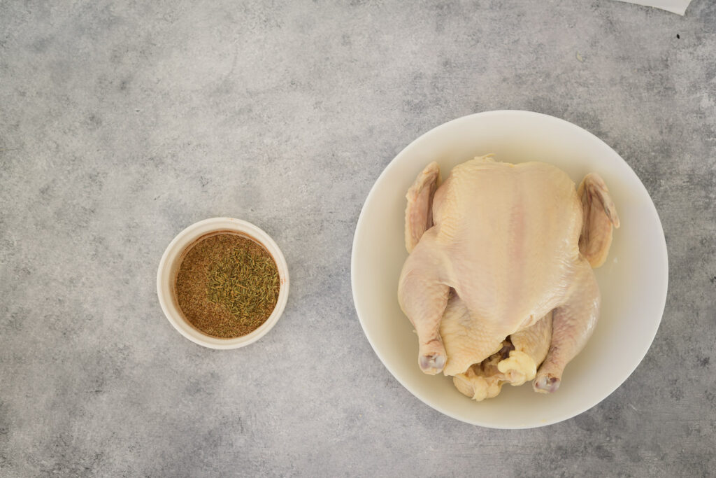 Corn hens after being seasoned with a mixture of spices.