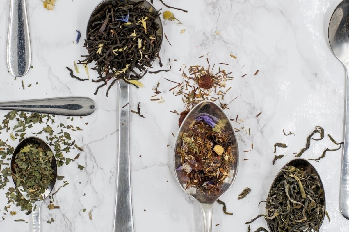 teaspoons with different dried teas