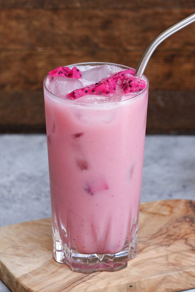 Make Starbucks' beautiful Pink Ombré Drink at home this summer! After the popular Pink Drink, the pink and white layered ombré drink is a new sensation on Instagram and other social media. It is made with a cool lemon flavored beverage topped with coconut milk and Teavana Shaken Iced Passionfruit. As soon as you plug in the straw, the two layers begin to curl into a beautiful ombré shape. #OmbrePinkDrink #OmbreDrink