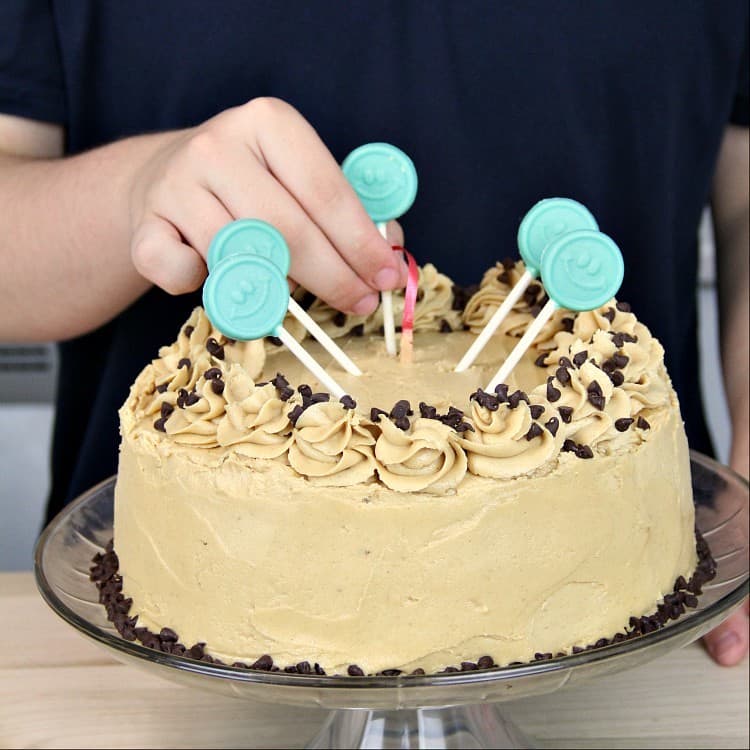 Money Cake on stand with lollipops