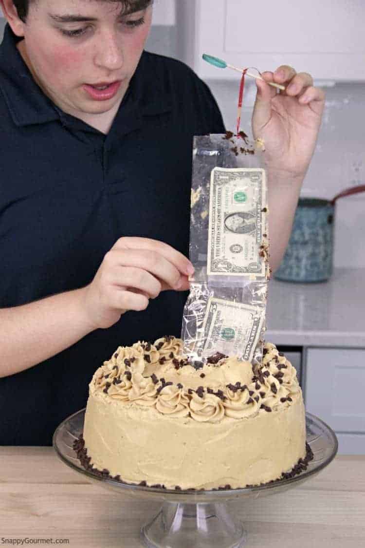 Money coming out of cake