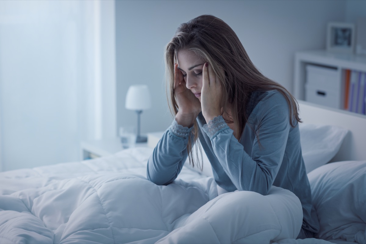 Depressed woman stays up all night, she's exhausted and can't sleep