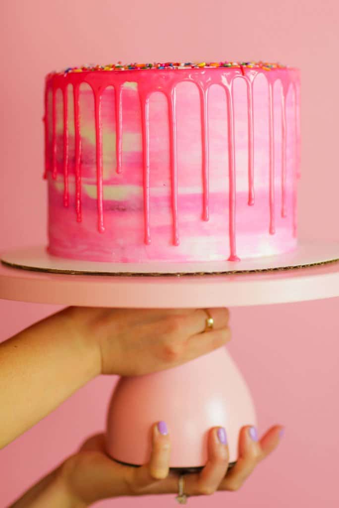 Add pink drops to vanilla cake using a spray bottle