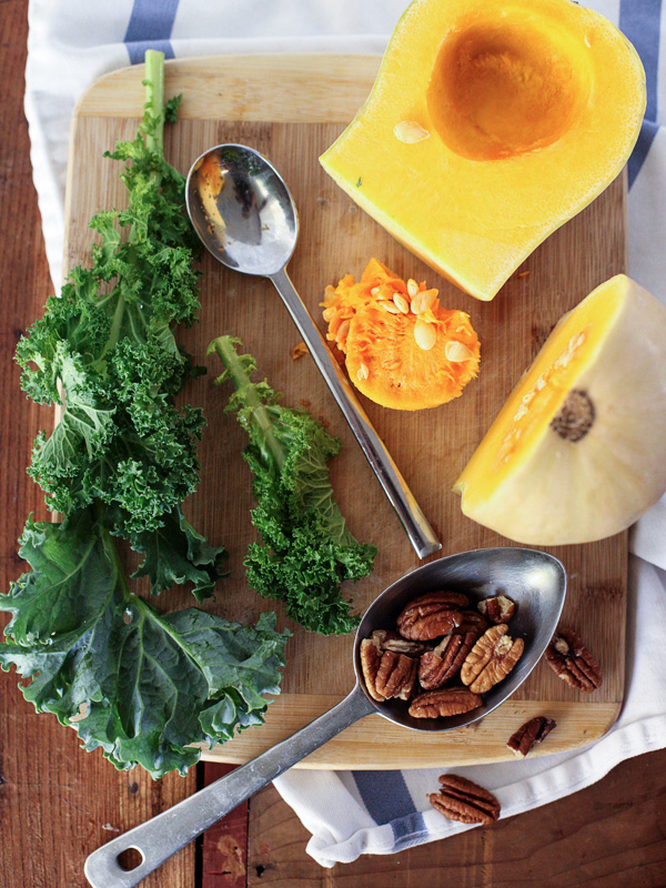 Kale Salad with Pumpkin, Chickpeas and Tahini Sauce on foodiecrush.com