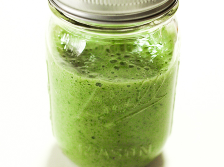 Green matcha in a transparent jar