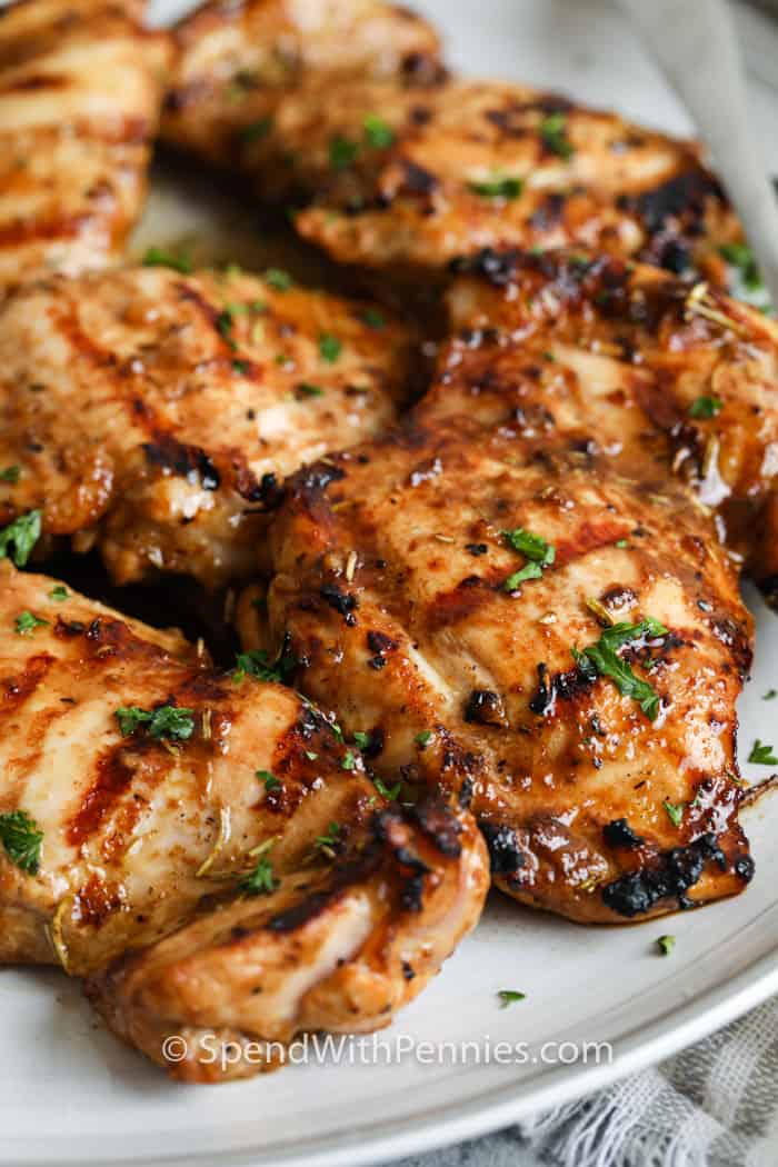 Close-up of grilled chicken thighs on a plate