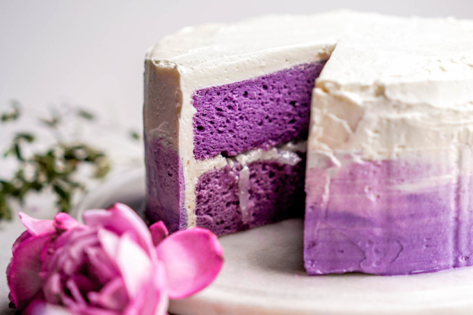 whole Filipino ube cake with slices taken out