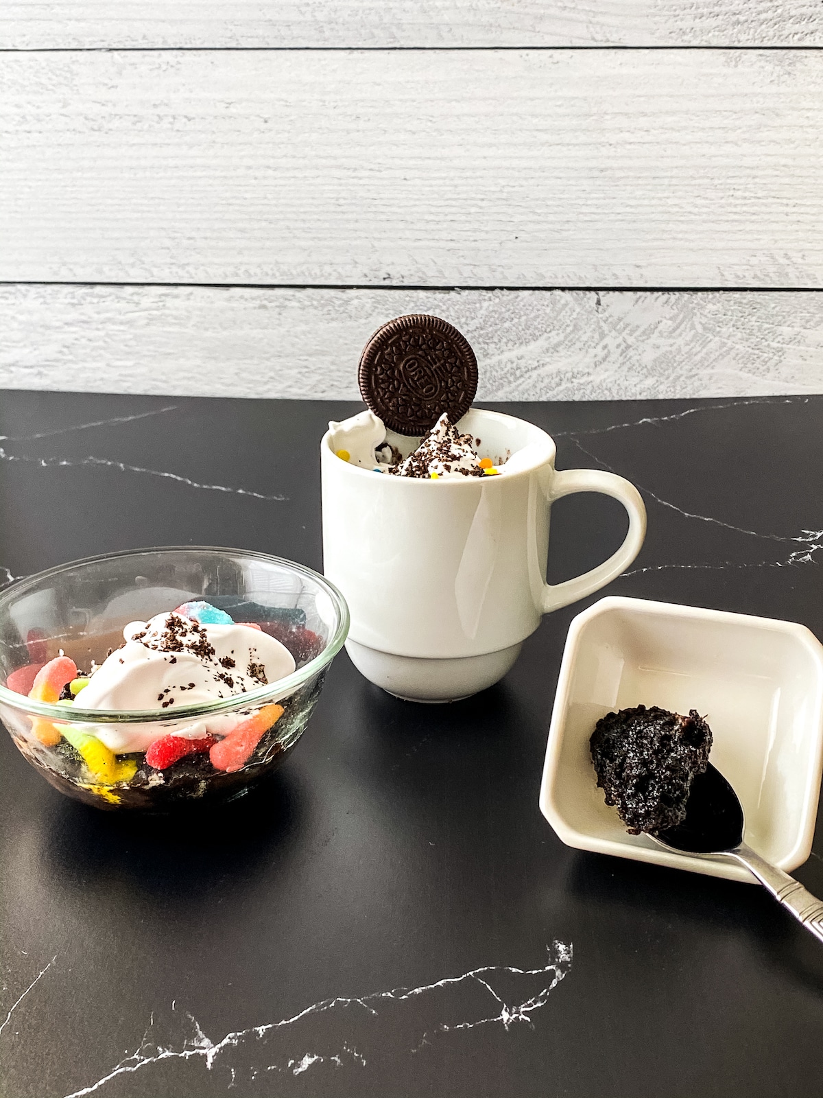 OREO cake cup on black table