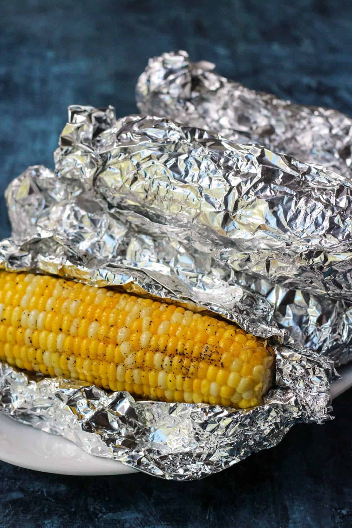 Roasted corn on the cob in foil