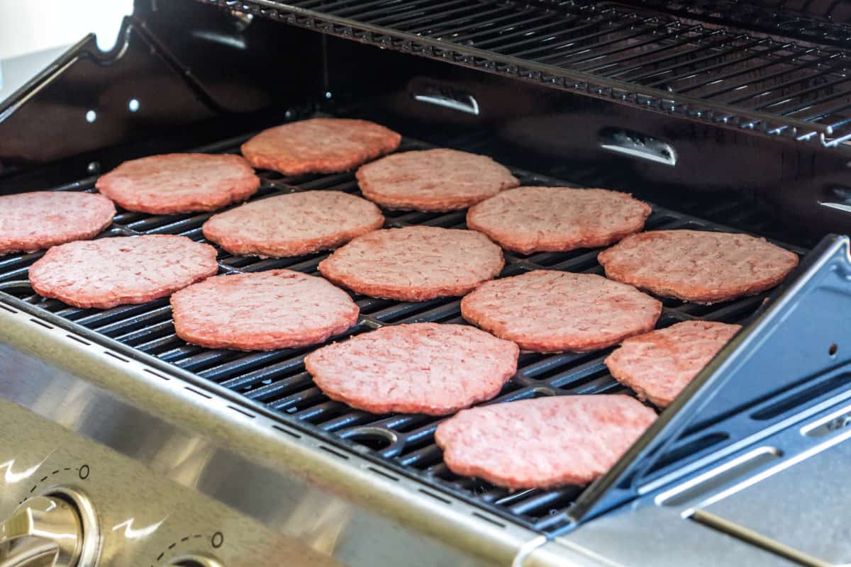 15 frozen burgers on gas stove