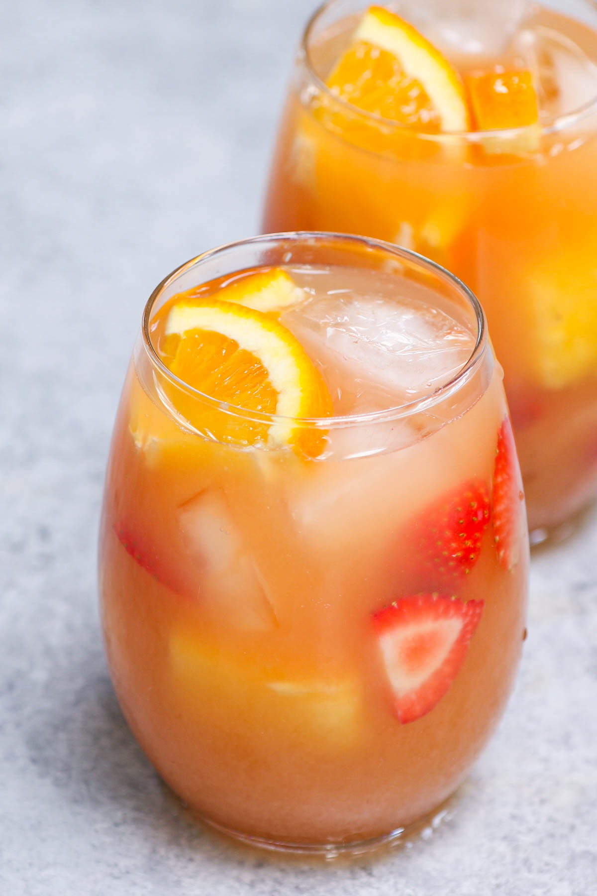 Forest juice is the easiest, tastiest way to serve up drinks at parties, holiday dinners, or for the Super Bowl! This affordable cocktail combines fruit juices and real fruit, with some rum and vodka to get the party going. This punch is sweet, aromatic and refreshing.