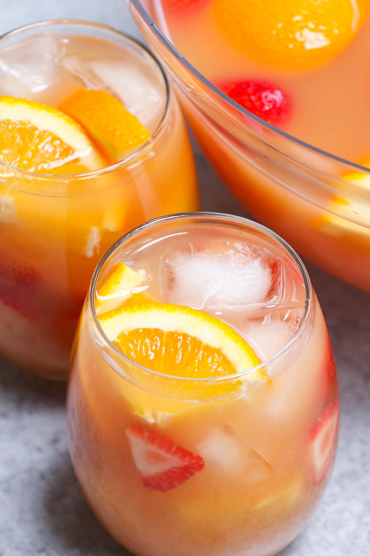 Forest juice is the easiest, tastiest way to serve up drinks at parties, holiday dinners, or for the Super Bowl! This affordable cocktail combines fruit juices and real fruit, with some rum and vodka to get the party going. This punch is sweet, aromatic and refreshing.