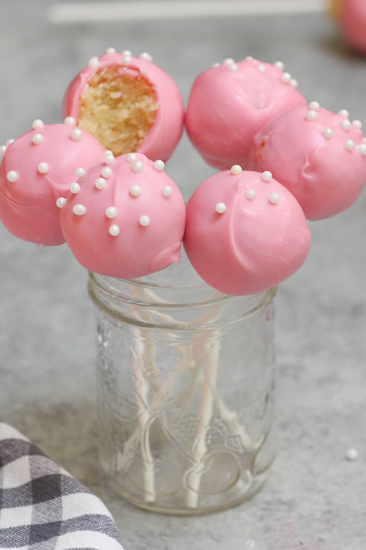 Cake pop is exactly what they sound like - a cross between cake and lollipops! These pink gifts are perfect for birthday parties. Although made very popular by coffee shop chains, these Starbucks Cake Pops can easily be recreated at home.