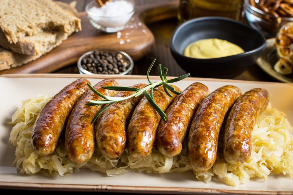 Grilled Sausage with Cabbage Salad, Mustard and Beer.