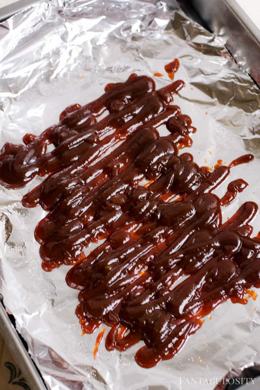 bbq sauce dripping on aluminum foil, reader for pork steak