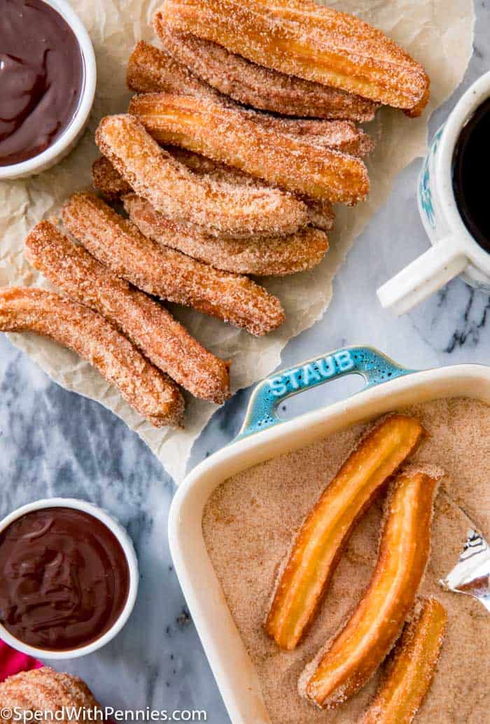 Churros are dipped in sugar