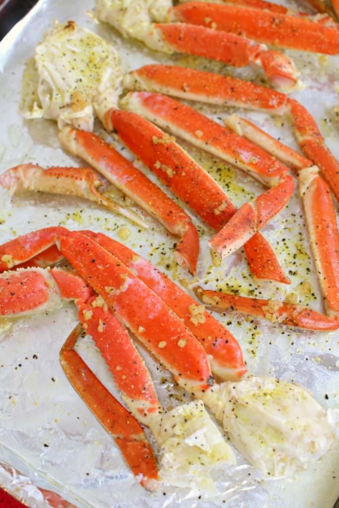 Want to know how to make Snow Crab Legs in the oven? With just 5 ingredients from ALDI, this Simple Oven Baked Snow Crab Legs recipe is quick and easy. Perfect for your holiday parties and dinners!