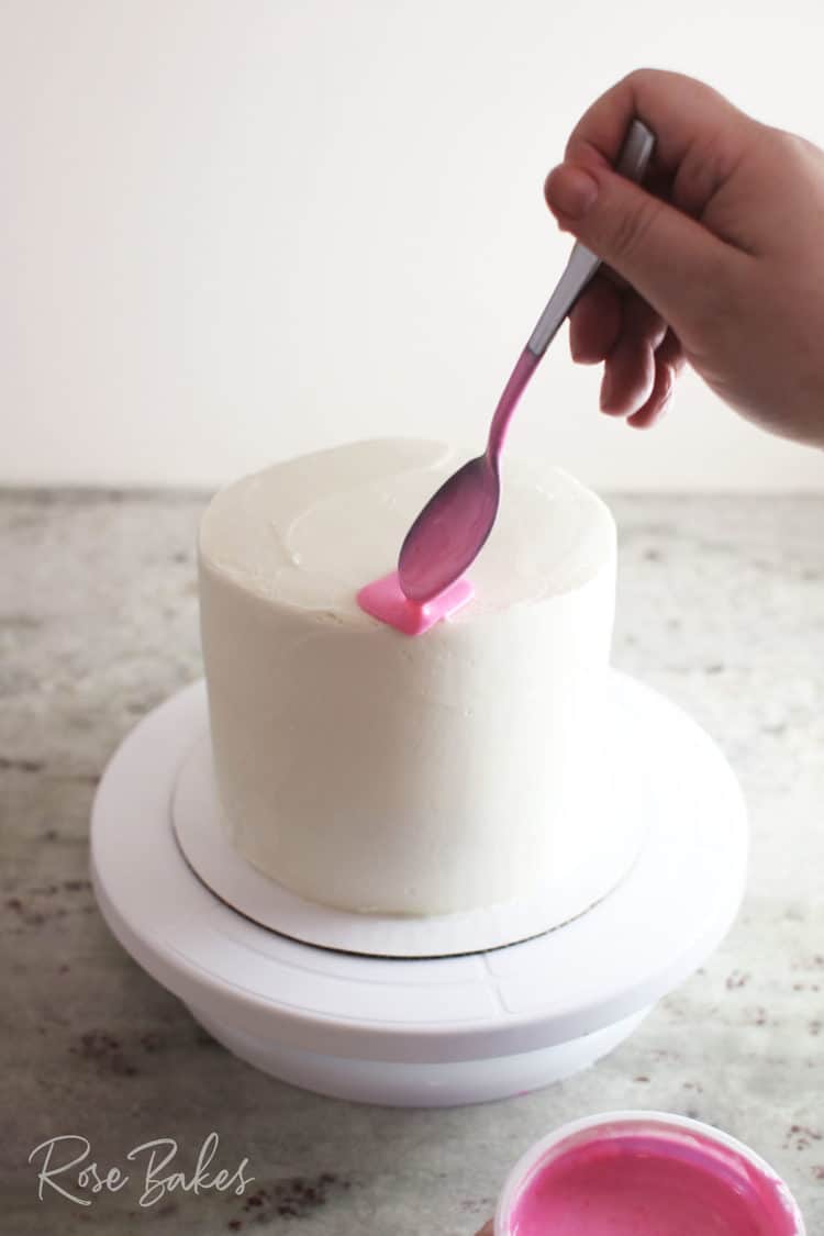 Finished canned drip cake - white cake with pink drip