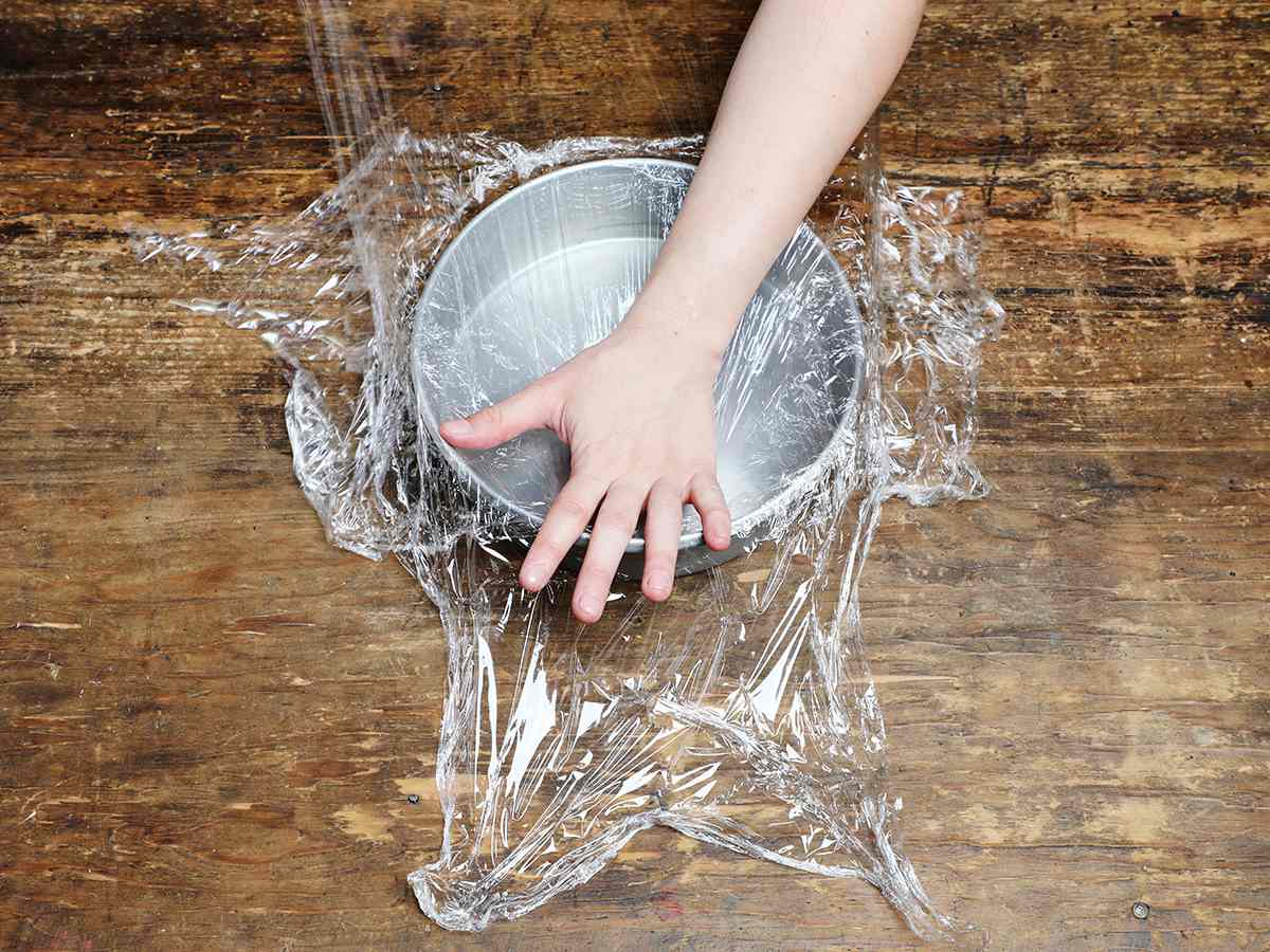Lining Cake Pan with Plastic Wrap