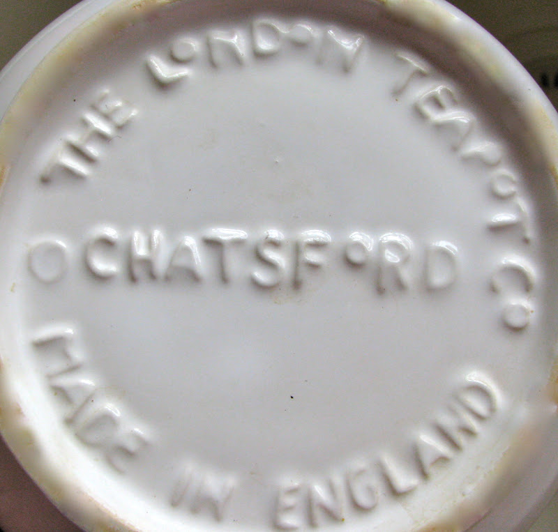 The bottom of the teapot has the words THE LONDON TEAPOT CO MADE IN ENGLAND, CHATSFORD at the bottom.