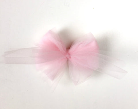 Try my tulle bow DIY tutorial for an easy accessory, gift box, party favors and more. This easy craft is great for kids too! # tulle #tullebow # rainbow # unique # handmade # interior design