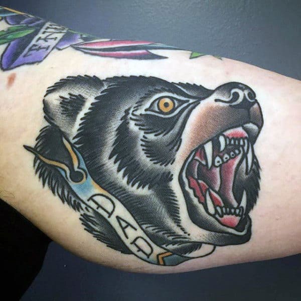 Guys Arms Growling Animal And Dad Tattoo