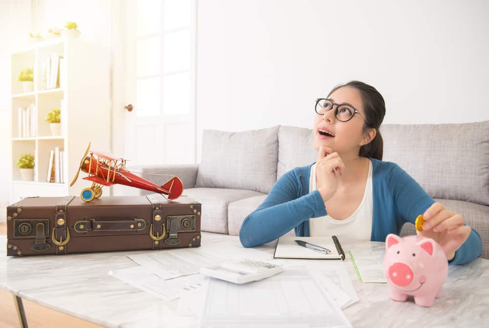 Woman thinking of saving money