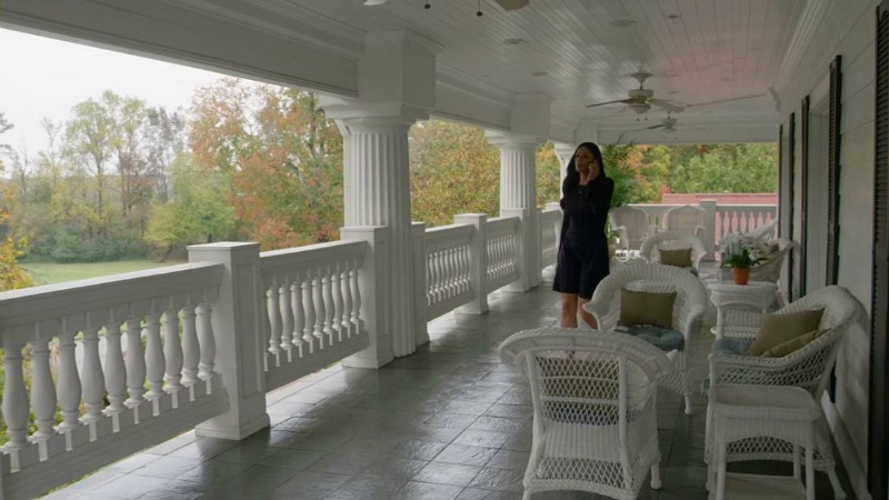 Grace Greenleaf on the porch second story