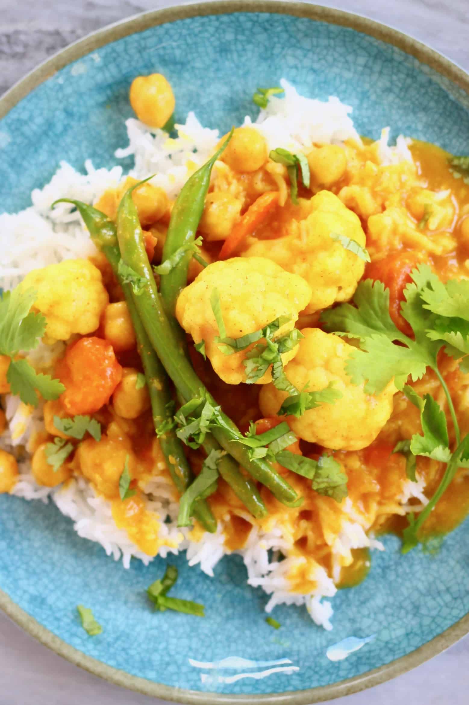 Potato bean curry in a white bowl