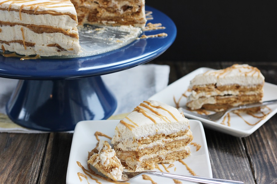 Nutter Butter Icebox Cake - Ice cream cake recipe made with Nutter Butter cookies, peanut butter cream sauce and peanut butter whipped cream. So rich! | www.worthwhisking.com