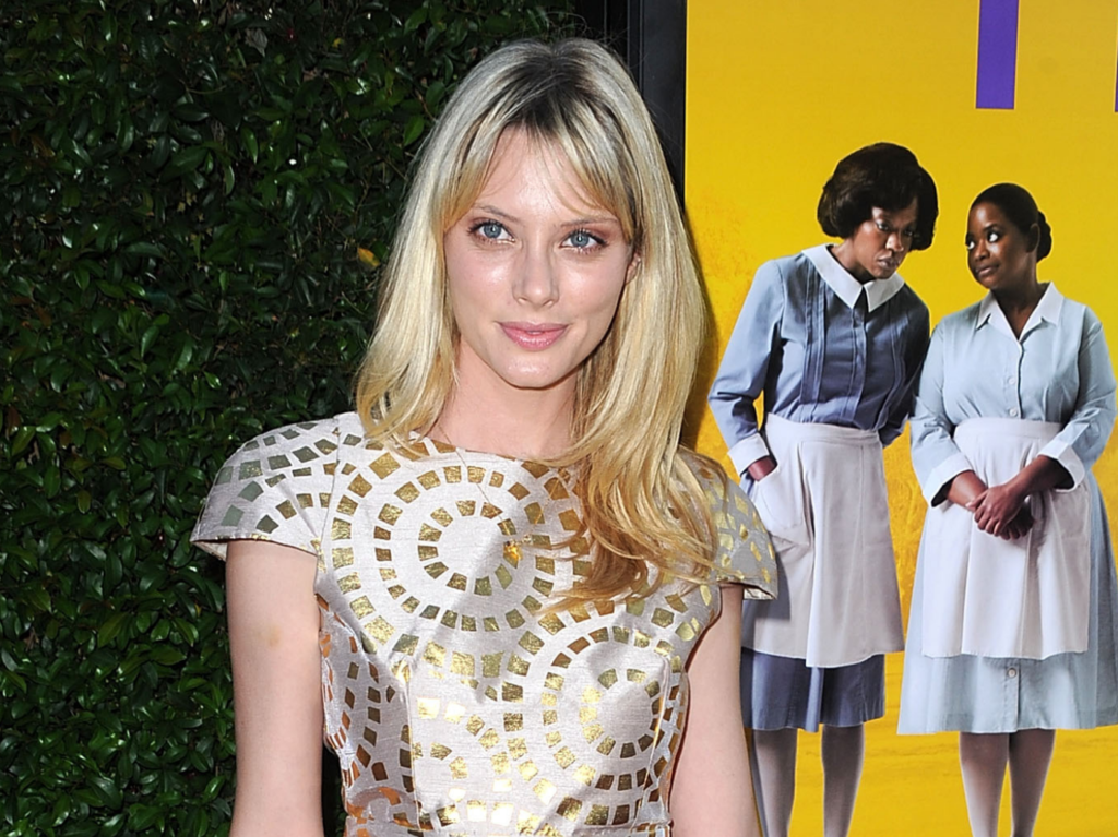 April Bowlby wears a striking yellow dress on the red carpet