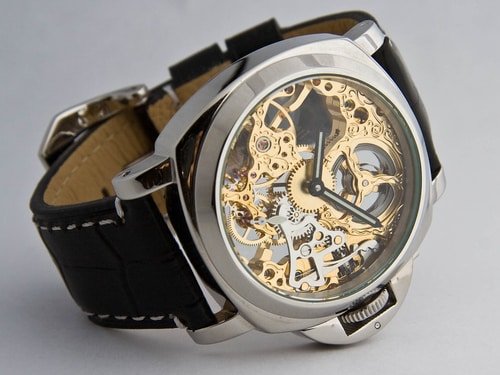 close up of skeleton watch face