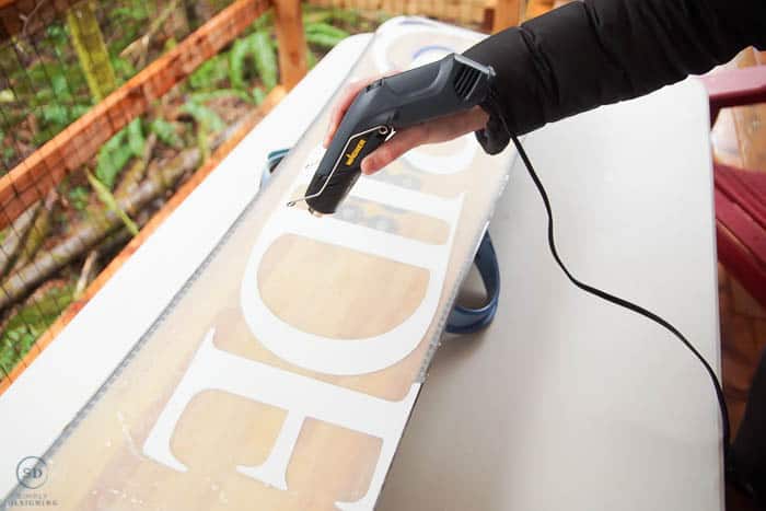 Use a heat gun to melt the wax on the bottom of the snowboard
