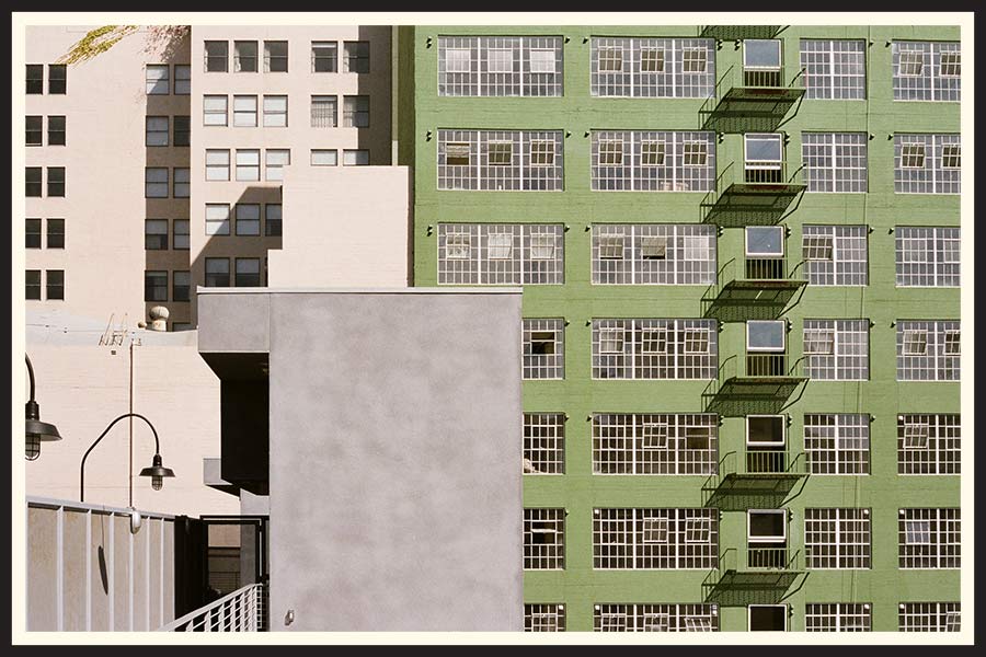 Film photo of a large, green building in Los Angeles