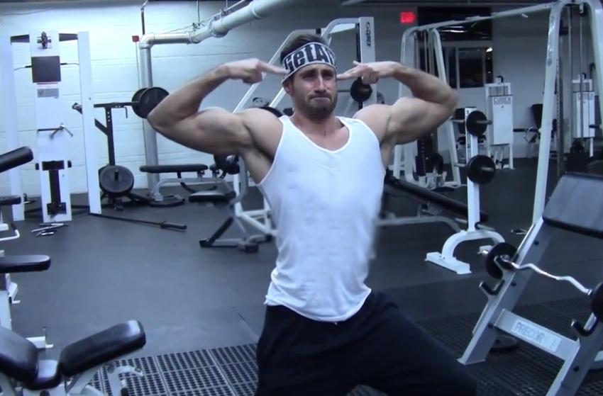 Dom Mazzetti doing silly poses in the gym