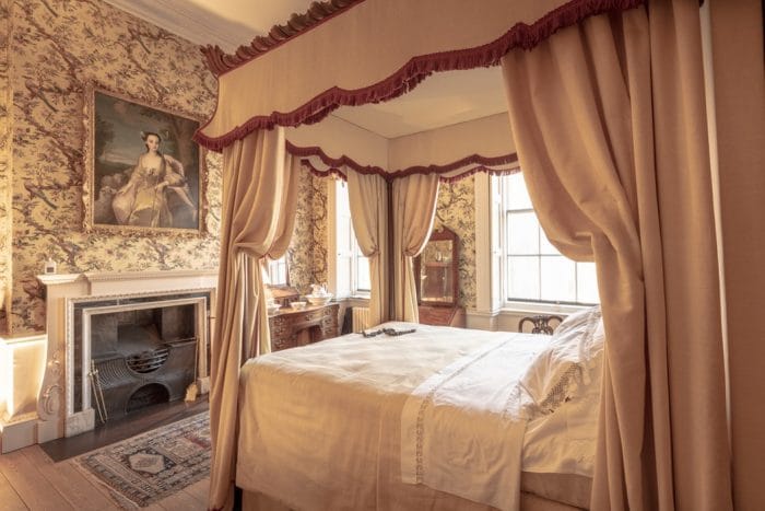 French style bedroom with four poster bed and canopy