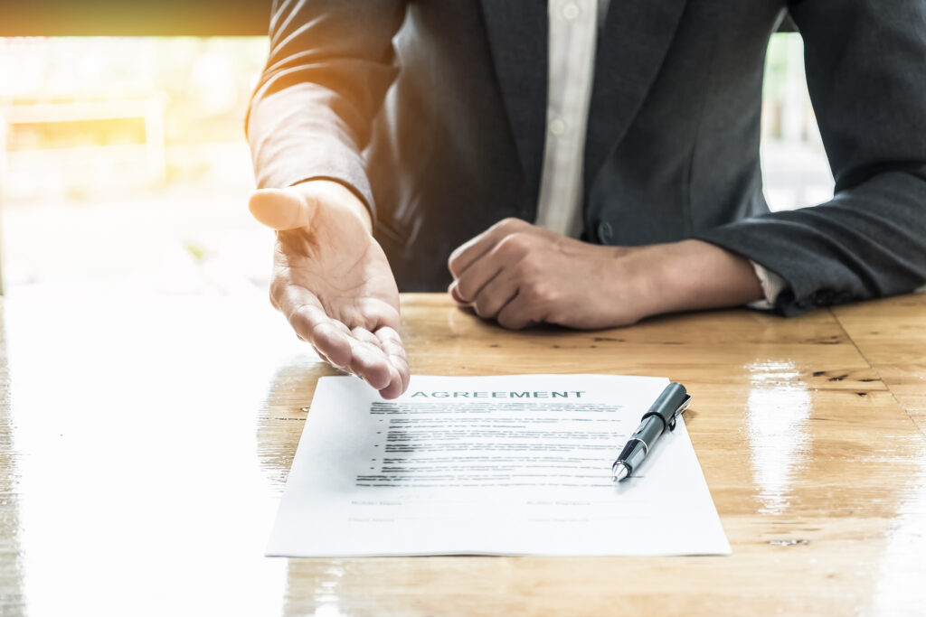 Close up business man waiting to sign the agreement 1024x683 1