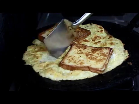 cut cooked bread omelette