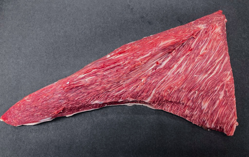 A photo of a whole three-headed steak