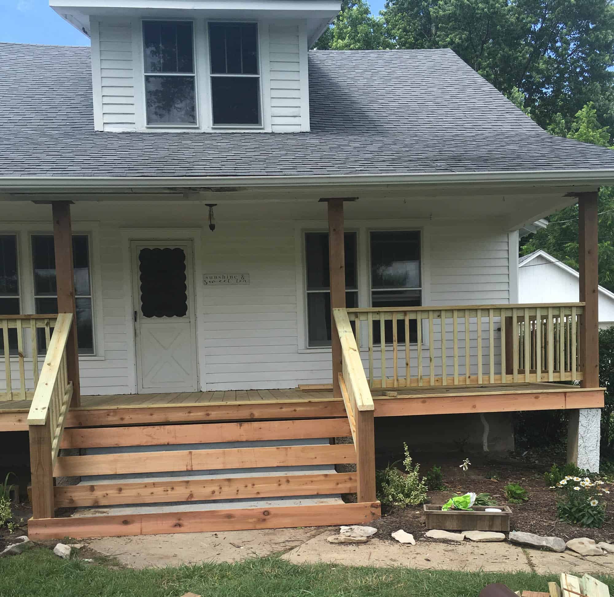 how to sheathe concrete stairs in front of a wooden porch