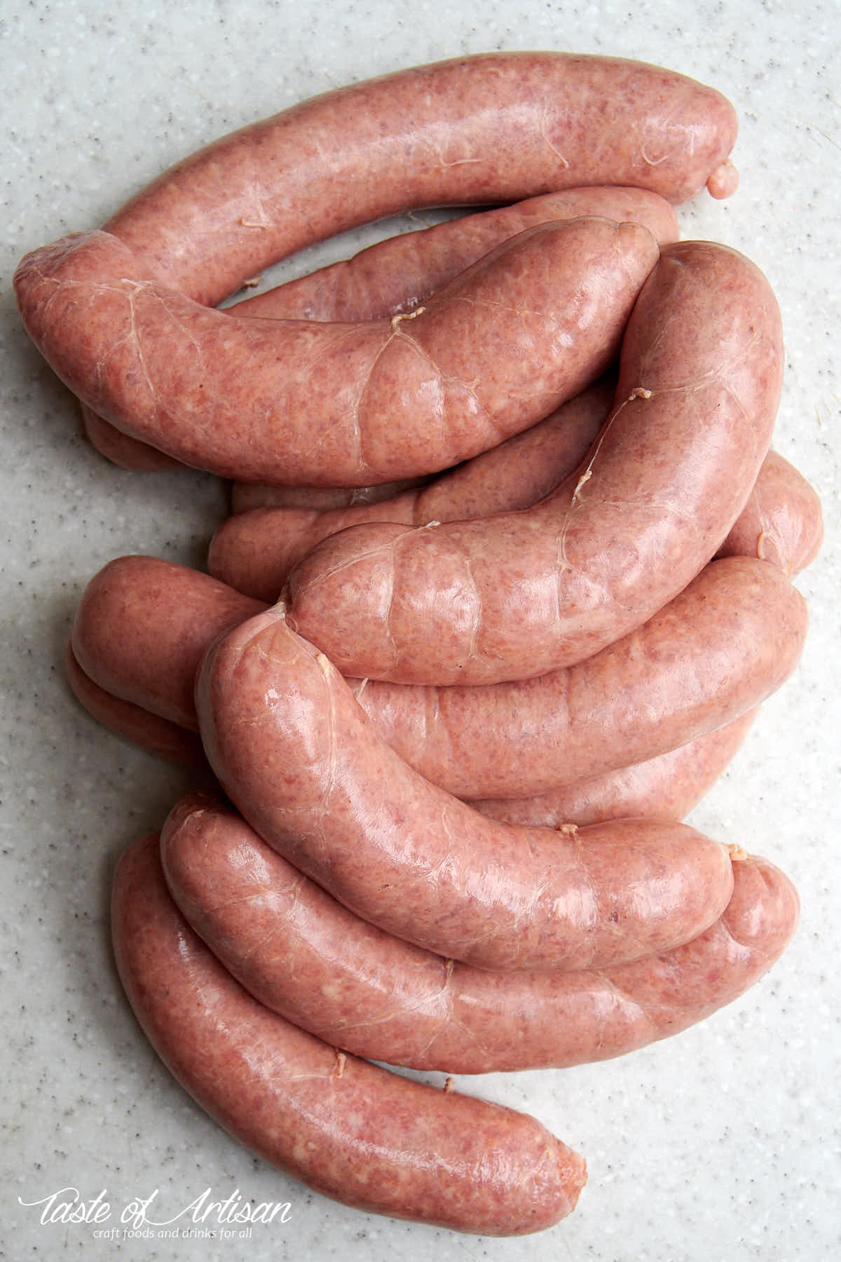 Bockwurst sausage blanched in a pot of water.