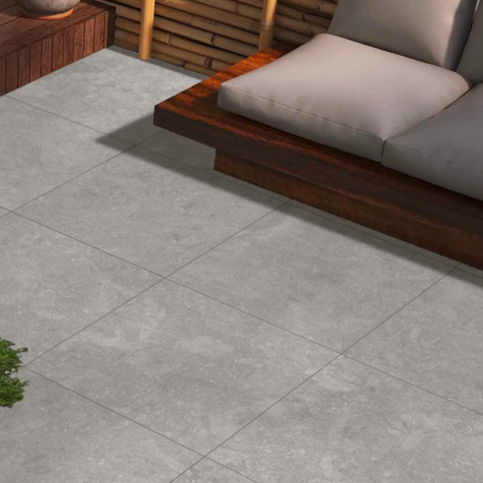 A terrace-style stone-effect gray porcelain courtyard area