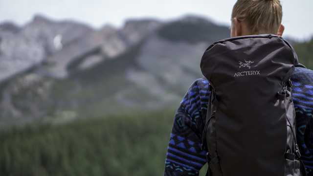 hiker with backpack arcteryx