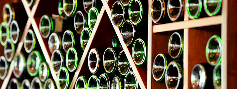 Why do wine bottles have gouges?