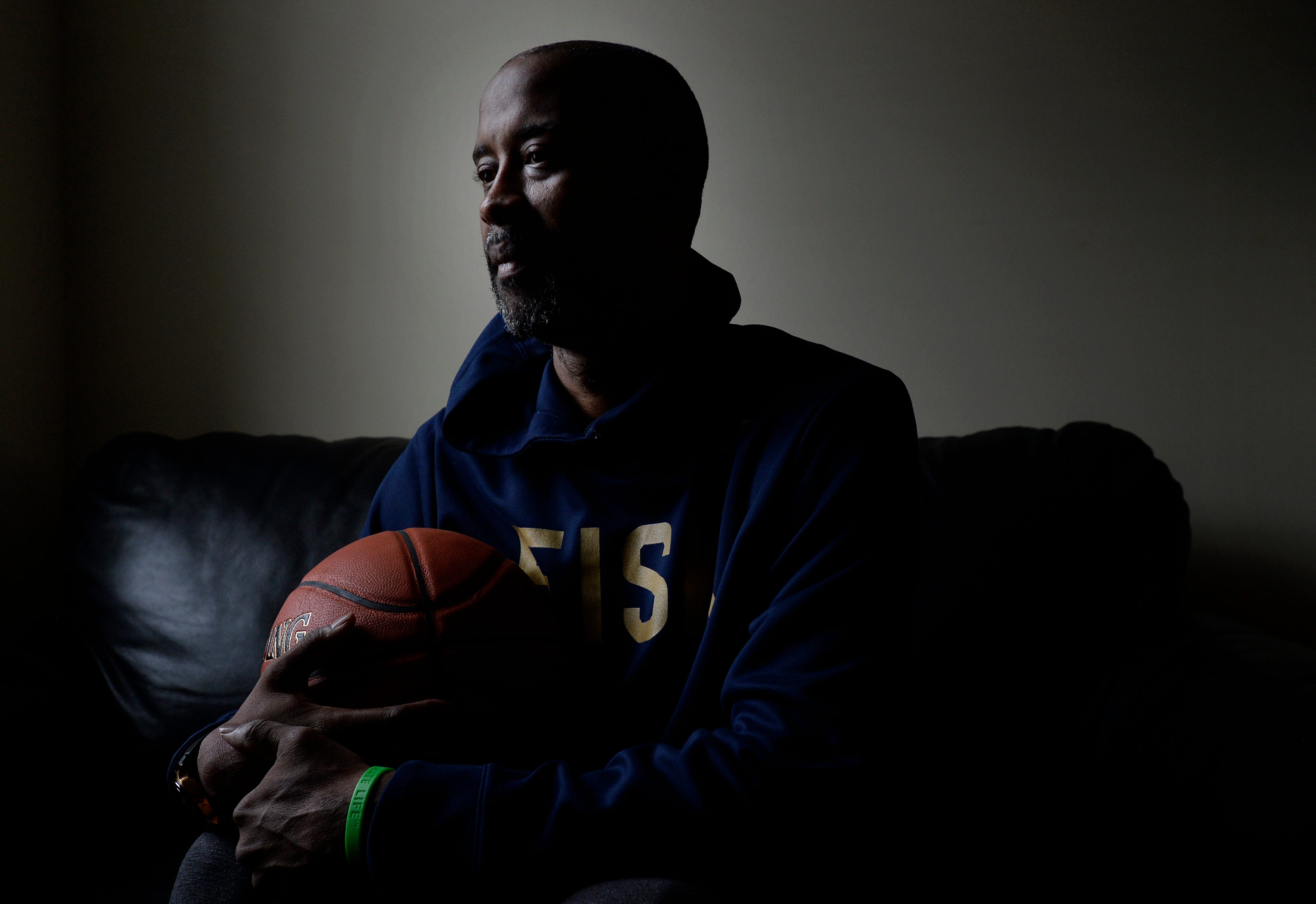 Fisk basketball coach Kenny Anderson sits at his home on March 12, 2020, in Nashville.